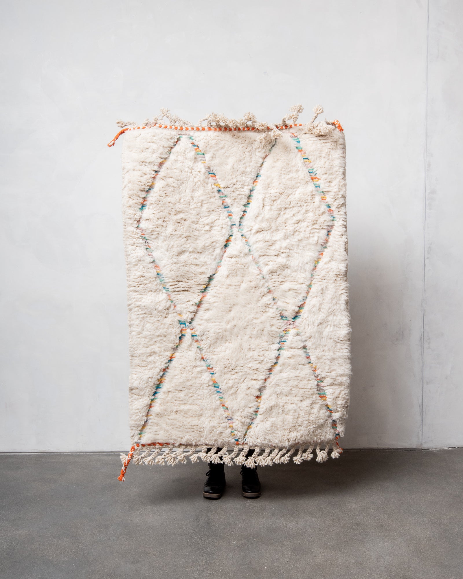 Modern, designer, handcrafted Berber rug from Morocco. Beniourain carpet with beautiful colours and patterns and fluffy wool texture.